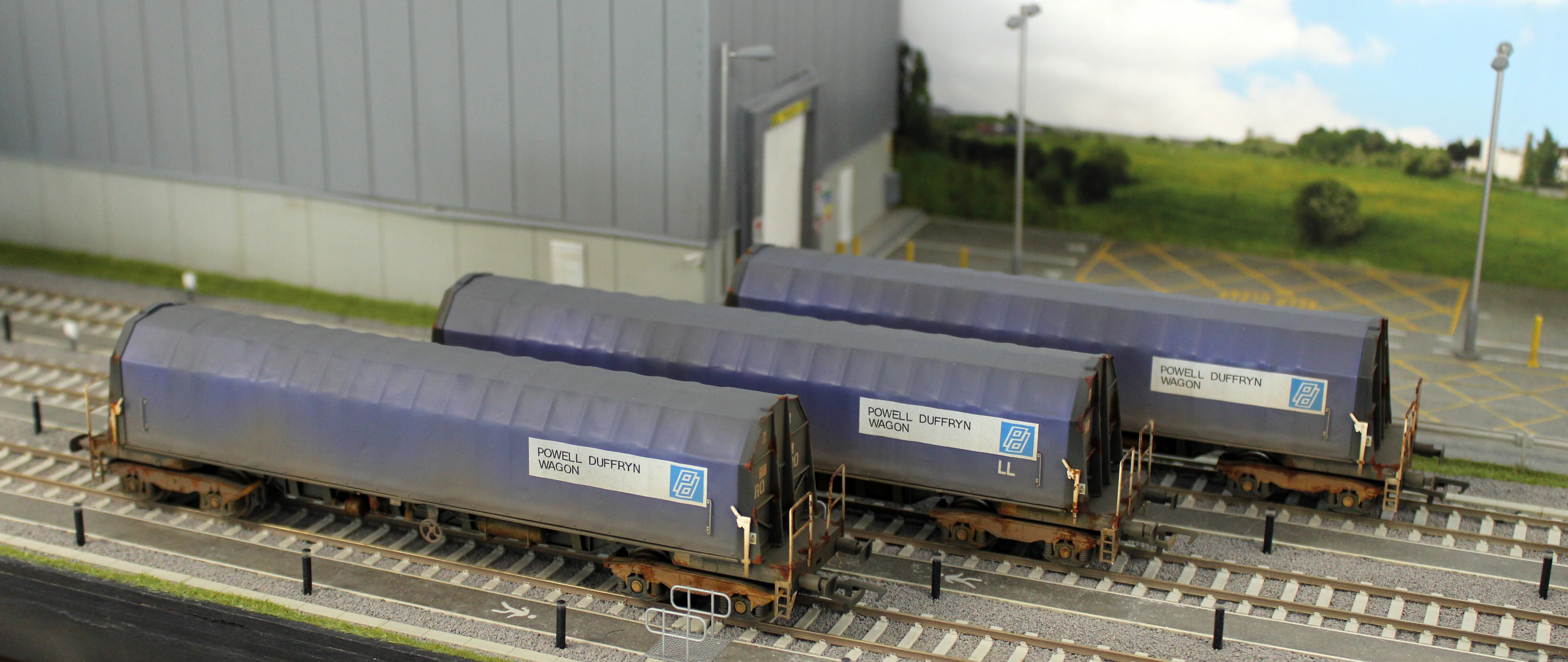 PXA01 TP(D)W Bespoke Weathered Set of 3 PXA Steel Coil Carrier PD Blue Tops Code JSA, Yellow Bogies & OHLW Sticker No.3032/3055/3041 - Image 11